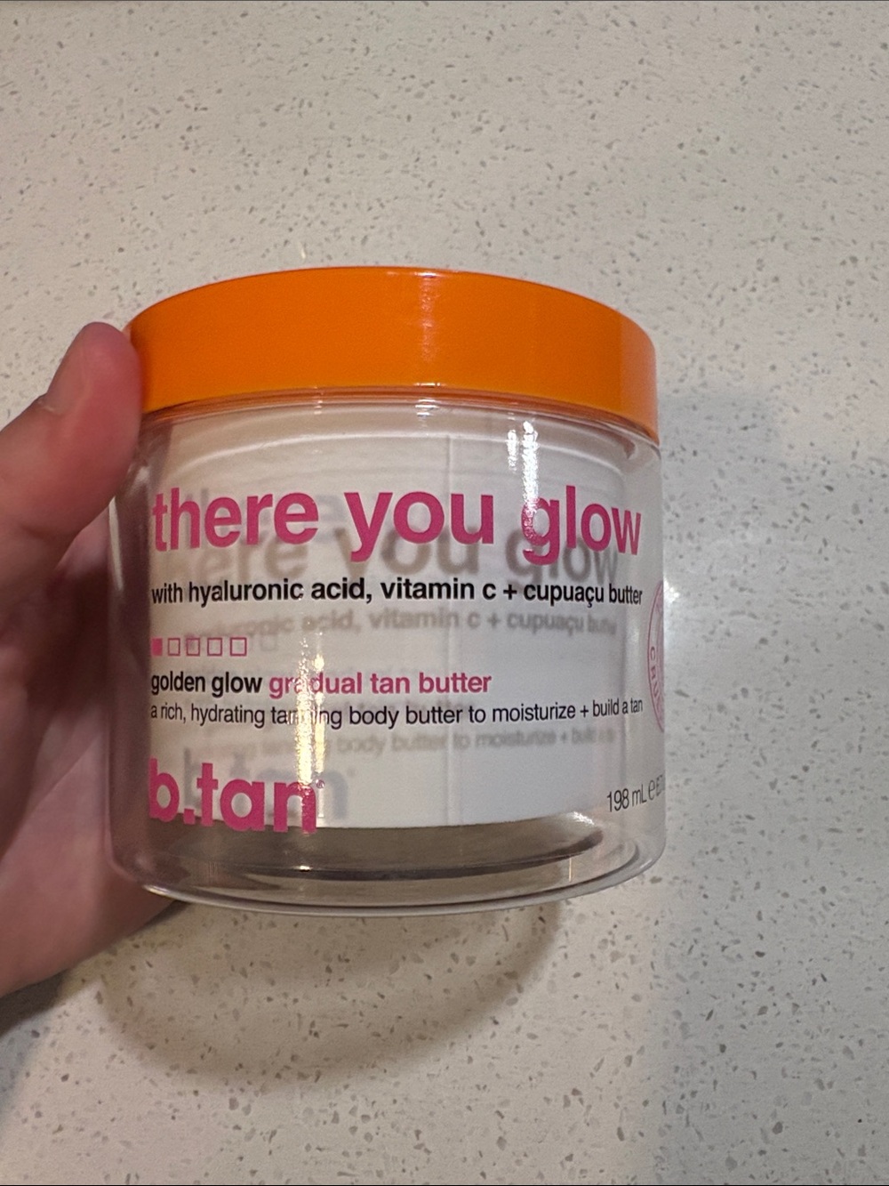 b.tan There You Glow Gradual Tan Butter - White & Pink Jar with Orange Lid
